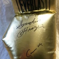 Iconsofboxing.com Cassius Clay And Smokin' Joe Frazier Super Rare Autographed 22 Inch Size Charity Everlast Gold Boxing Glove TOP FIGHTERS