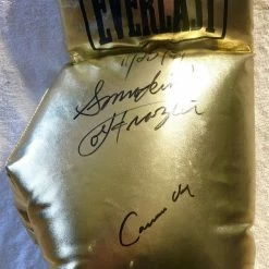 Iconsofboxing.com Cassius Clay And Smokin' Joe Frazier Super Rare Autographed 22 Inch Size Charity Everlast Gold Boxing Glove TOP FIGHTERS