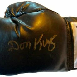 Iconsofboxing.com Hall Of Famer Don King Autographed Black Everlast Boxing Glove With A Rare Gold Signature. BOXING MEMORABILIA