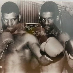 Iconsofboxing.com Leon Spinks Michael Spinks Signed Autographed 11x14 Photo Fanatics TOP FIGHTERS