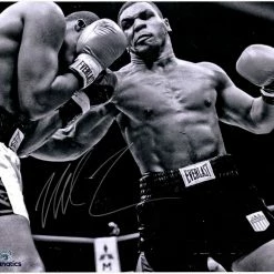 Iconsofboxing.com Mike Tyson Autographed Amazing Rare 16" X 20" Black/White Punching Photograph