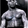 Iconsofboxing.com Mike Tyson Autographed 16" X 20" Black & White Fighting Stance Photograph