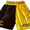 Iconsofboxing.com TOP FIGHTERS Roberto Duran Vs Tommy Hearns Custom Boxing Trunks Autographed In Silver Signature