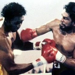 Iconsofboxing.com TOP FIGHTERS Roberto Duran Vs Tommy Hearns Custom Boxing Trunks Autographed In Silver Signature