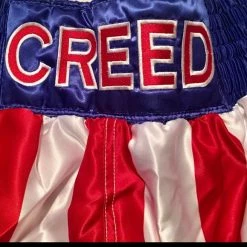 Iconsofboxing.com Carl Weathers Signed Custom Boxing Trunks Inscribed