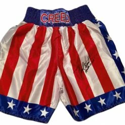 Iconsofboxing.com Carl Weathers Signed Custom Boxing Trunks Inscribed "Apollo Creed" BOXING MEMORABILIA