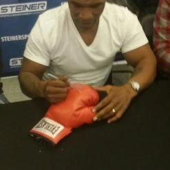 Iconsofboxing.com Mike Tyson Silver Autographed Red Everlast Boxing Glove Steiner Certified With Photo Proof. BOXING MEMORABILIA