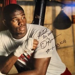 Iconsofboxing.com Riddick Bowe 16 X 20 AUTOGRAPHED WITH INSCRIPTIONS PHOTO