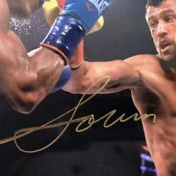 Iconsofboxing.com Vasyl Lomachenko Action Packed Autographed 8x10 Fighting Photo With A Gold Signature, JSA TOP FIGHTERS
