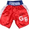 Iconsofboxing.com TOP FIGHTERS George Foreman Signed Boxing Trunks (JSA COA & Foreman Hologram)