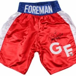 Iconsofboxing.com TOP FIGHTERS George Foreman Signed Boxing Trunks (JSA COA & Foreman Hologram)