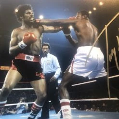 Iconsofboxing.com BOXING MEMORABILIA Larry Holmes Vs Leon Spinks Signed Autographed 8x10 Boxing Photo
