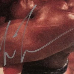 Iconsofboxing.com BOXING MEMORABILIA Mike Tyson Signed 16x20 "MadMan" Photo (JSA COA)