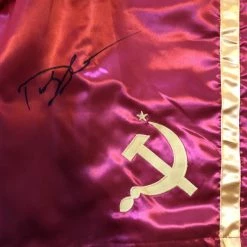 Iconsofboxing.com BOXING MEMORABILIA Dolph Lundgren Red And Yellow Drago Hand Made Boxing Trunks Signed