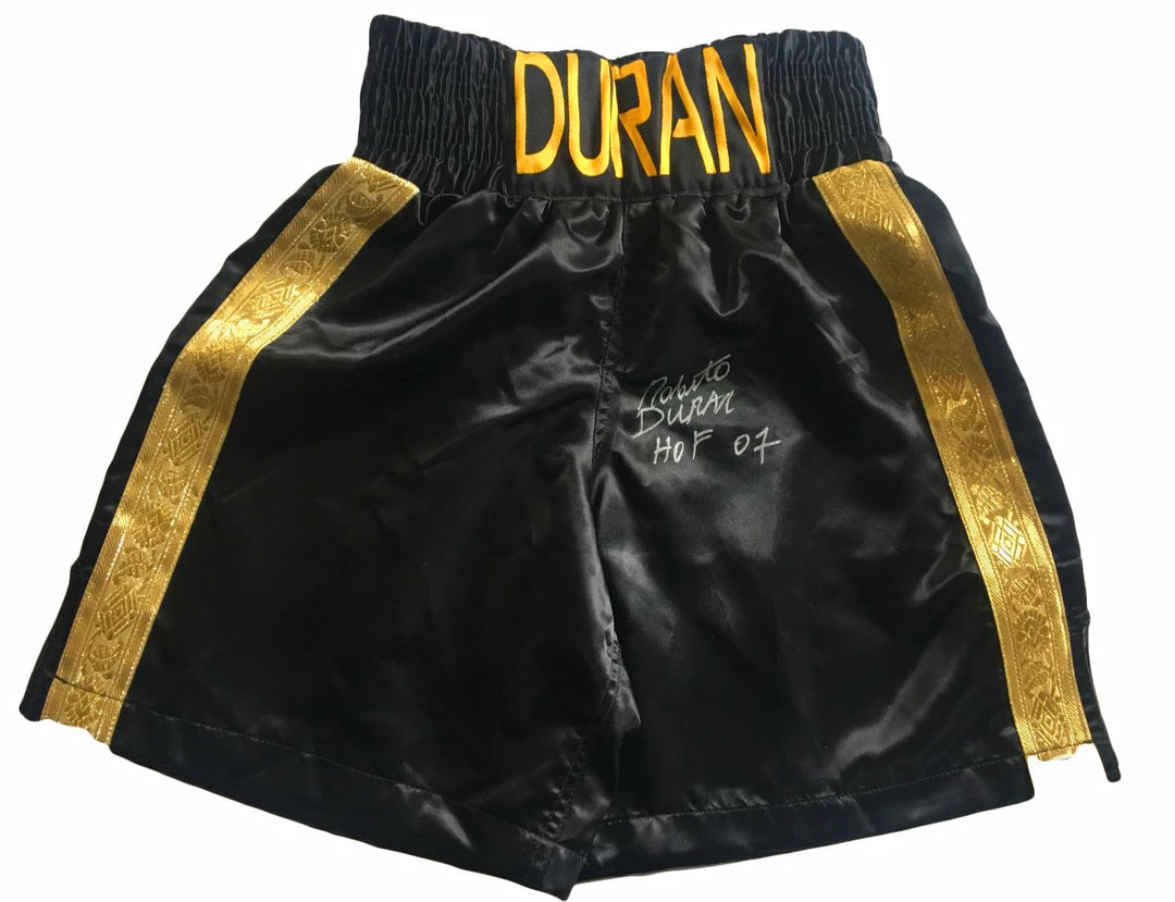 Iconsofboxing.com Roberto Duran Custom Boxing Trunks Autographed In Silver Signature And HOF Inscription Added PSA/DNA