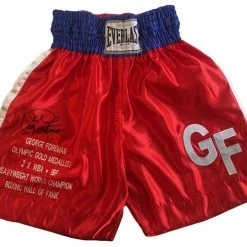 Iconsofboxing.com George Foreman Autographed Custom Made Everlast Boxing Trunks.