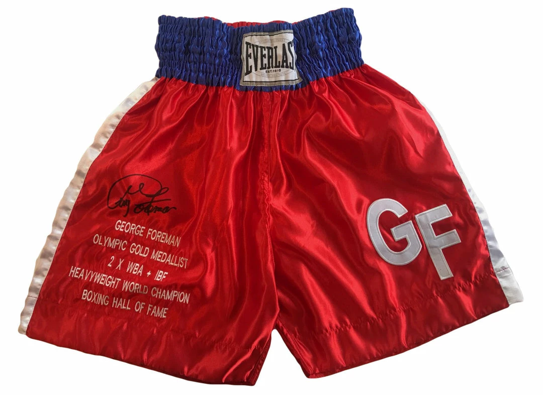 Iconsofboxing.com George Foreman Autographed Custom Made Everlast Boxing Trunks.