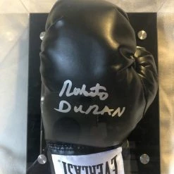 Iconsofboxing.com Roberto Duran Autographed Signed Everlast Blk/Silver Horizontal Boxing Gloves Display. TOP FIGHTERS